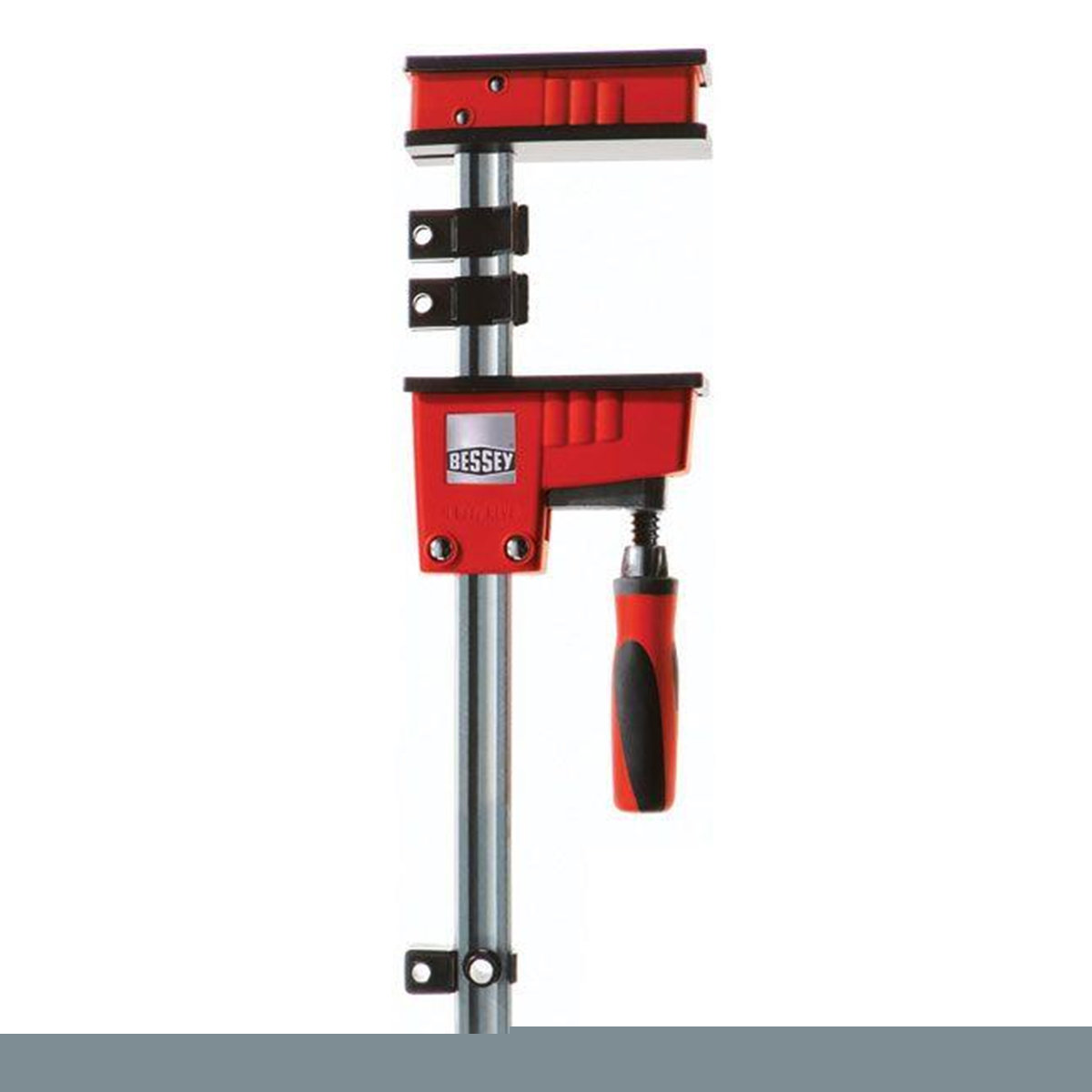 Parallel clamps. These are very heavy, but supply even pressure across the entire jaw length and do not twist when you tighten them. The jaws do not generally dent wood.